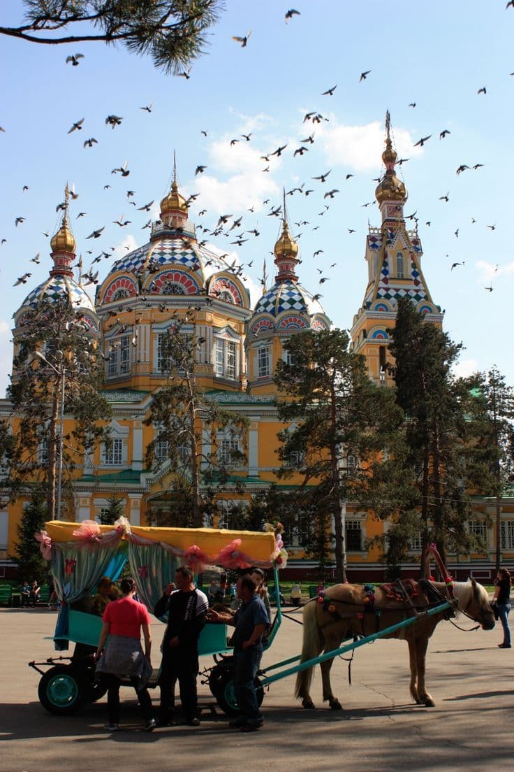 Almaty's Blue Jewels: Where Sunken Trees and Glacial Mirrors Rest.