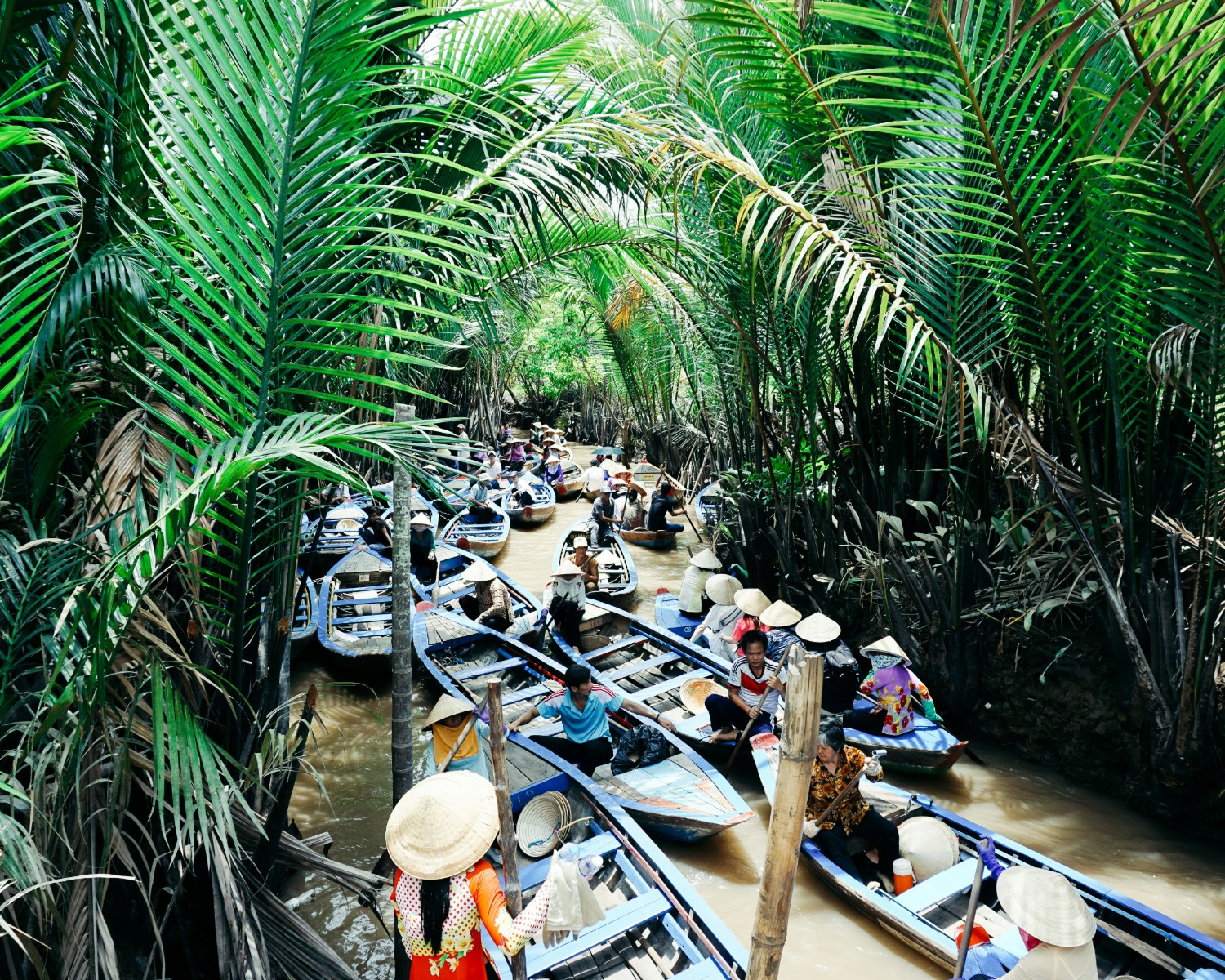 Floating villages with traditional stilt houses and waterways