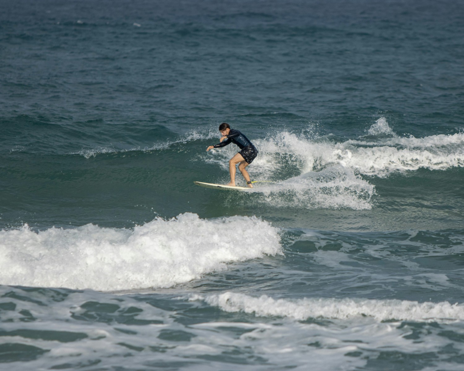 Surfing world-class breaks during monsoon season